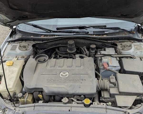 Сірий Мазда 6, об'ємом двигуна 2 л та пробігом 250 тис. км за 3600 $, фото 3 на Automoto.ua