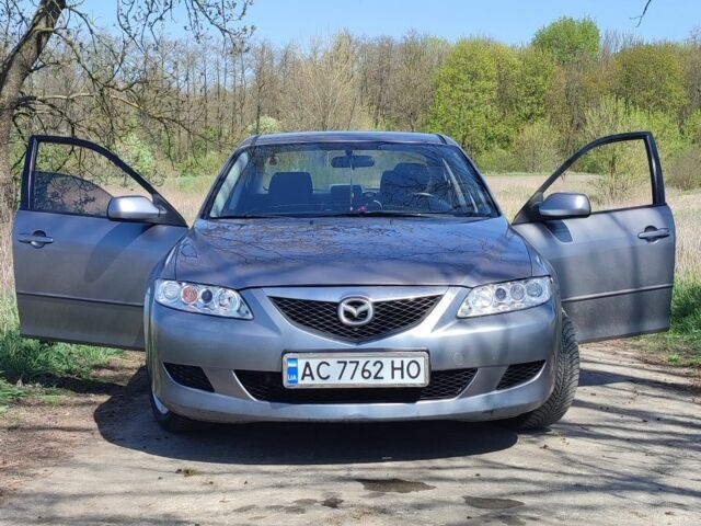 Серый Мазда 6, объемом двигателя 2 л и пробегом 350 тыс. км за 2850 $, фото 1 на Automoto.ua