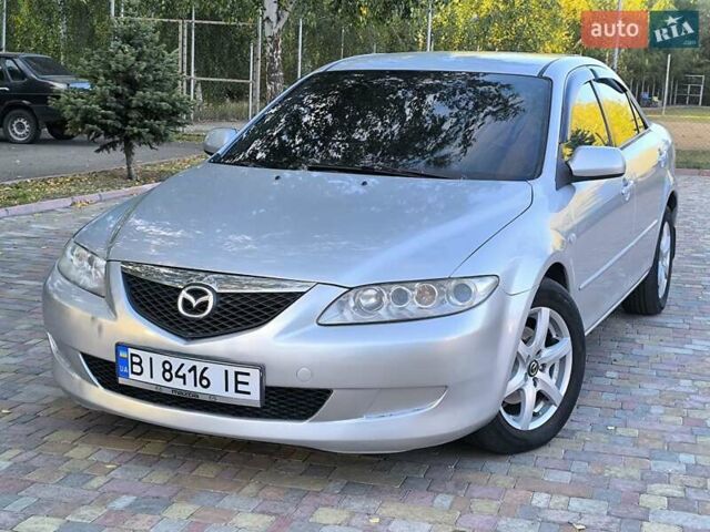 Серый Мазда 6, объемом двигателя 2 л и пробегом 243 тыс. км за 3900 $, фото 2 на Automoto.ua