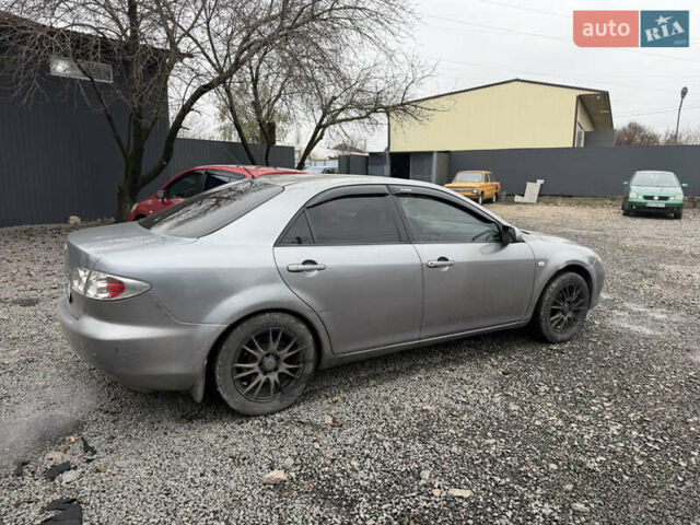 Серый Мазда 6, объемом двигателя 2 л и пробегом 230 тыс. км за 2850 $, фото 5 на Automoto.ua