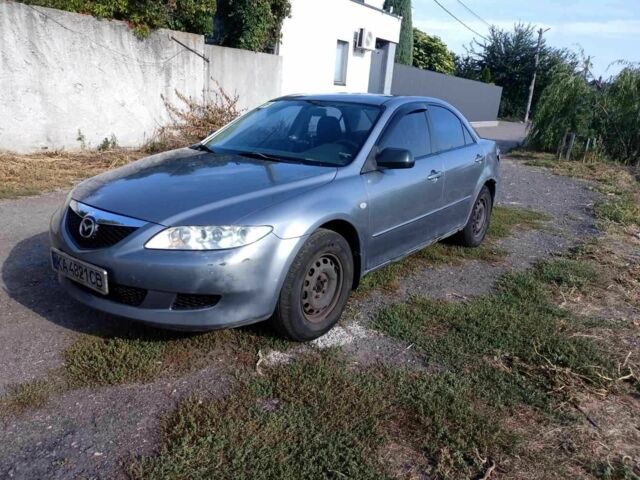 Серый Мазда 6, объемом двигателя 2 л и пробегом 112 тыс. км за 3300 $, фото 1 на Automoto.ua