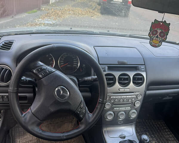 Сірий Мазда 6, об'ємом двигуна 2.3 л та пробігом 518 тис. км за 2100 $, фото 7 на Automoto.ua