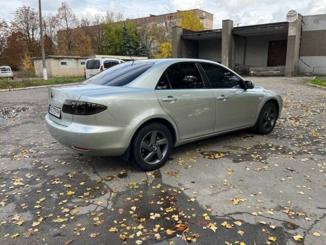 Серый Мазда 6, объемом двигателя 2 л и пробегом 255 тыс. км за 4500 $, фото 4 на Automoto.ua