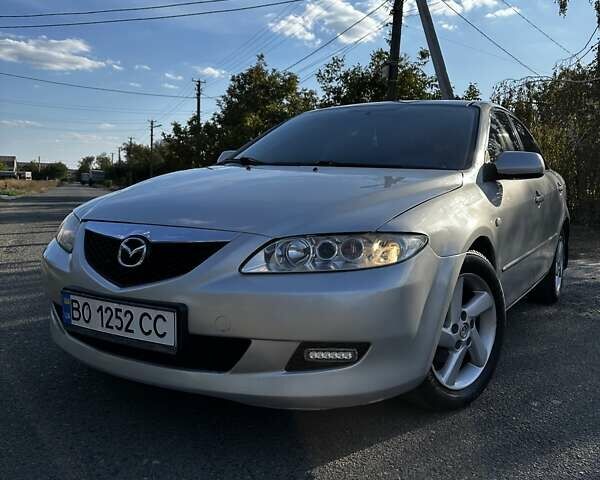 Серый Мазда 6, объемом двигателя 1.8 л и пробегом 232 тыс. км за 3850 $, фото 2 на Automoto.ua