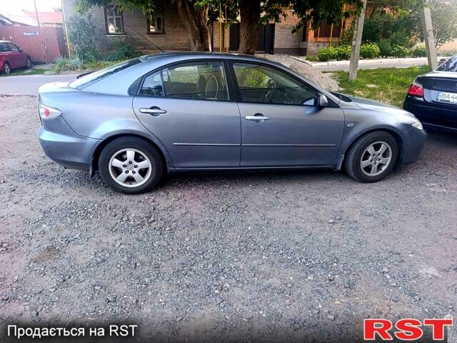 Серый Мазда 6, объемом двигателя 1.8 л и пробегом 320 тыс. км за 3600 $, фото 3 на Automoto.ua