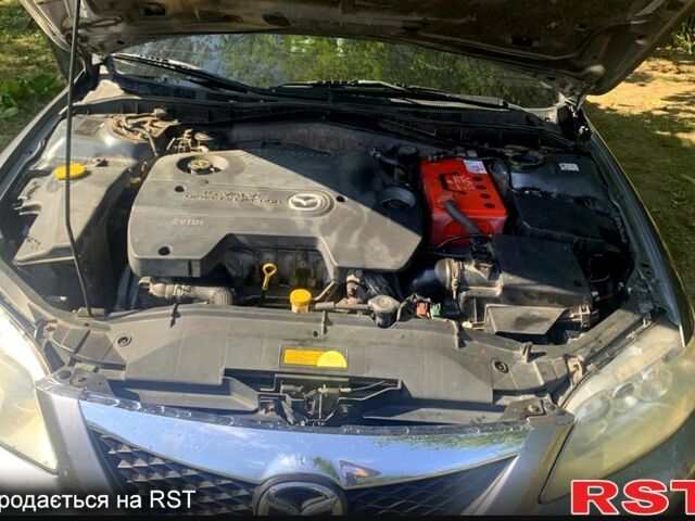 Серый Мазда 6, объемом двигателя 2 л и пробегом 300 тыс. км за 5000 $, фото 2 на Automoto.ua