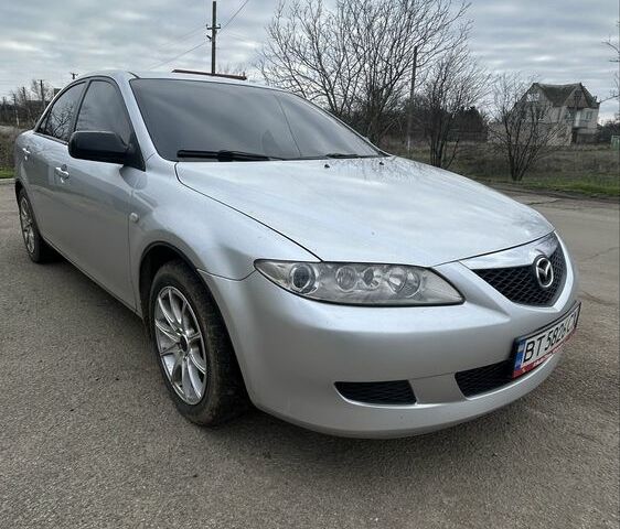 Серый Мазда 6, объемом двигателя 2 л и пробегом 250 тыс. км за 4300 $, фото 1 на Automoto.ua