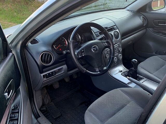 Сірий Мазда 6, об'ємом двигуна 2 л та пробігом 412 тис. км за 3700 $, фото 4 на Automoto.ua