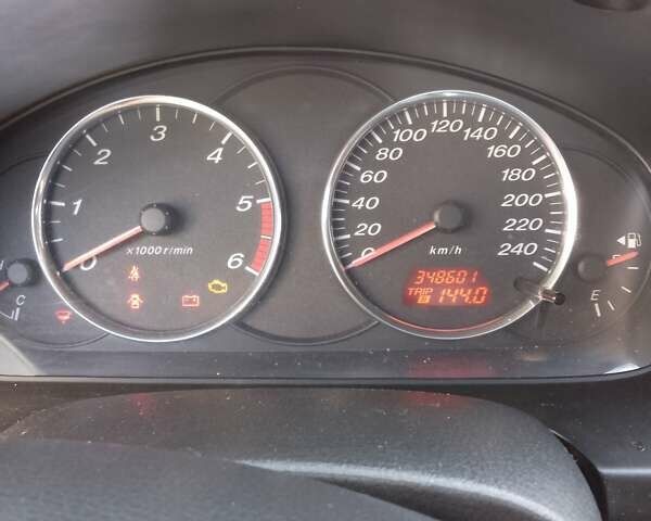 Серый Мазда 6, объемом двигателя 2 л и пробегом 349 тыс. км за 3300 $, фото 8 на Automoto.ua