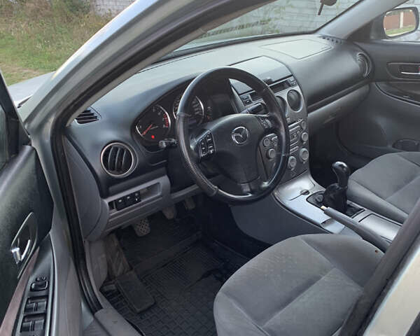 Серый Мазда 6, объемом двигателя 2 л и пробегом 412 тыс. км за 3700 $, фото 7 на Automoto.ua