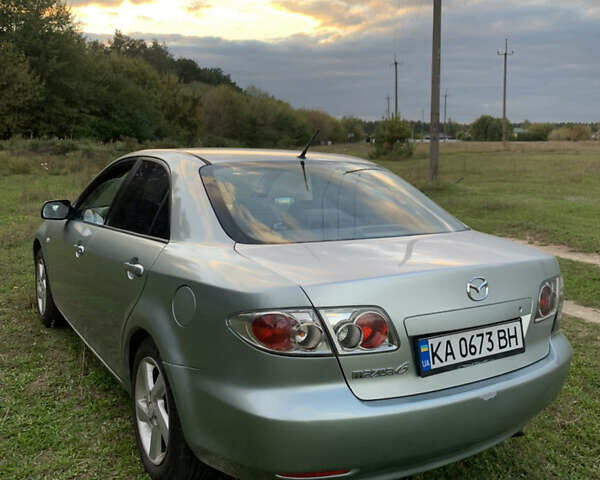 Серый Мазда 6, объемом двигателя 2 л и пробегом 412 тыс. км за 4000 $, фото 5 на Automoto.ua