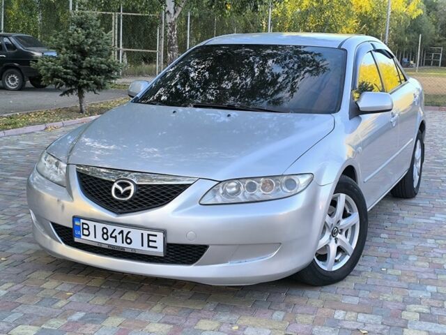 Серый Мазда 6, объемом двигателя 2 л и пробегом 243 тыс. км за 3900 $, фото 9 на Automoto.ua