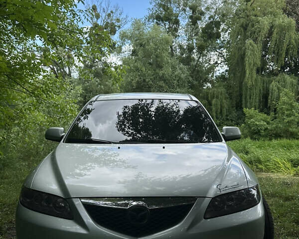 Серый Мазда 6, объемом двигателя 2 л и пробегом 320 тыс. км за 4000 $, фото 2 на Automoto.ua