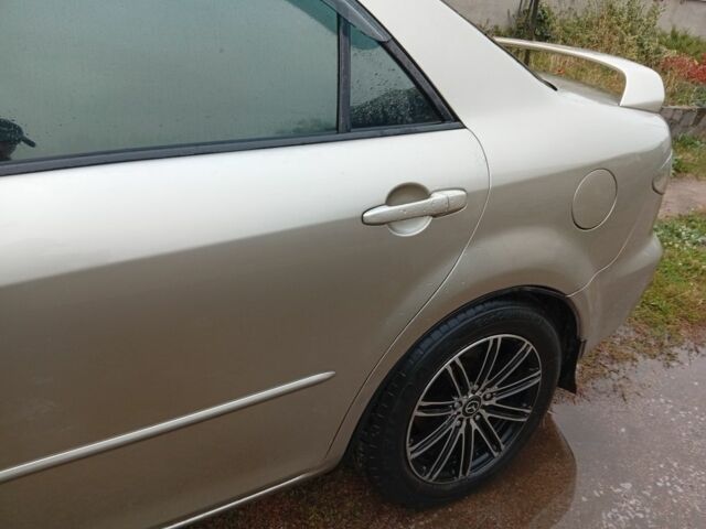 Серый Мазда 6, объемом двигателя 2 л и пробегом 215 тыс. км за 3800 $, фото 2 на Automoto.ua