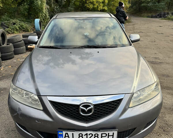 Сірий Мазда 6, об'ємом двигуна 2 л та пробігом 244 тис. км за 4000 $, фото 1 на Automoto.ua