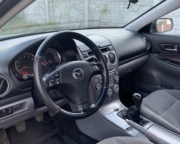 Серый Мазда 6, объемом двигателя 2 л и пробегом 412 тыс. км за 4000 $, фото 1 на Automoto.ua