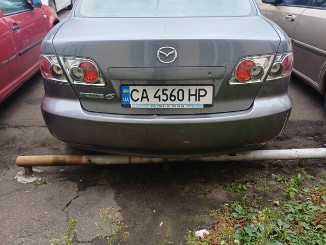 Серый Мазда 6, объемом двигателя 2 л и пробегом 260 тыс. км за 3300 $, фото 4 на Automoto.ua