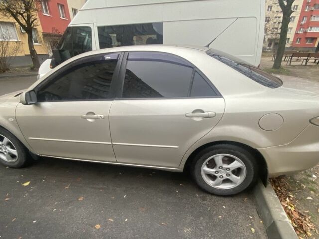 Сірий Мазда 6, об'ємом двигуна 2 л та пробігом 337 тис. км за 4150 $, фото 2 на Automoto.ua