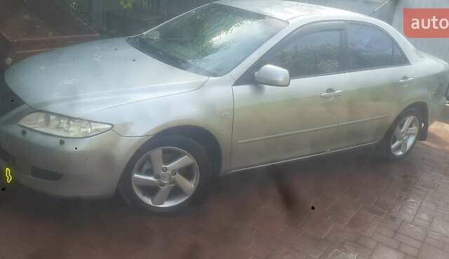 Сірий Мазда 6, об'ємом двигуна 2 л та пробігом 260 тис. км за 3100 $, фото 4 на Automoto.ua