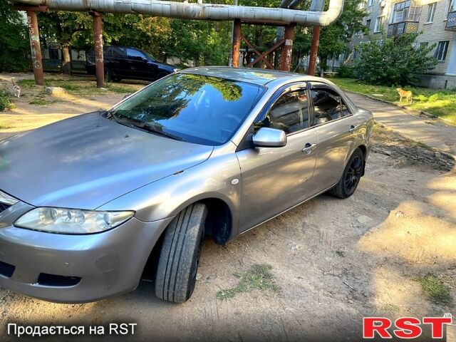 Серый Мазда 6, объемом двигателя 2 л и пробегом 240 тыс. км за 3000 $, фото 1 на Automoto.ua