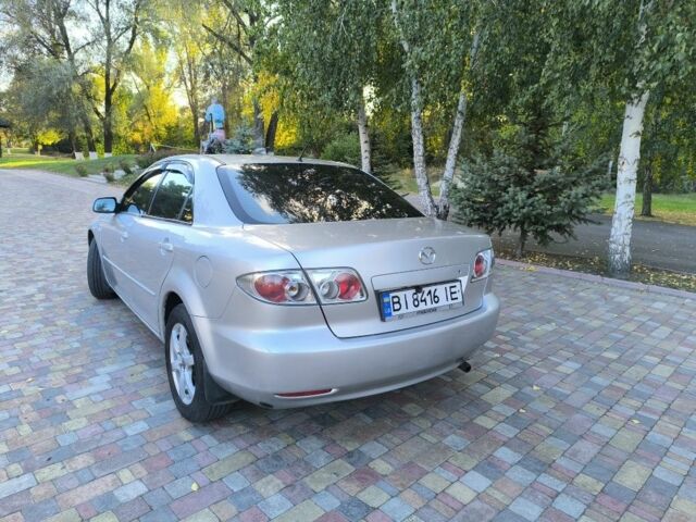 Серый Мазда 6, объемом двигателя 2 л и пробегом 243 тыс. км за 3900 $, фото 6 на Automoto.ua