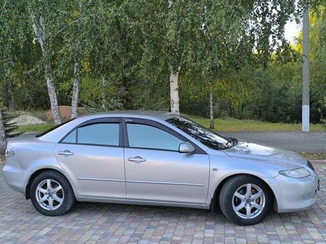 Серый Мазда 6, объемом двигателя 2 л и пробегом 243 тыс. км за 3900 $, фото 21 на Automoto.ua