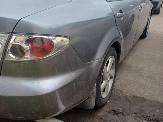 Серый Мазда 6, объемом двигателя 2 л и пробегом 260 тыс. км за 3300 $, фото 5 на Automoto.ua