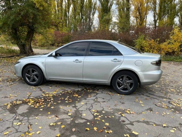 Серый Мазда 6, объемом двигателя 2 л и пробегом 255 тыс. км за 4500 $, фото 1 на Automoto.ua