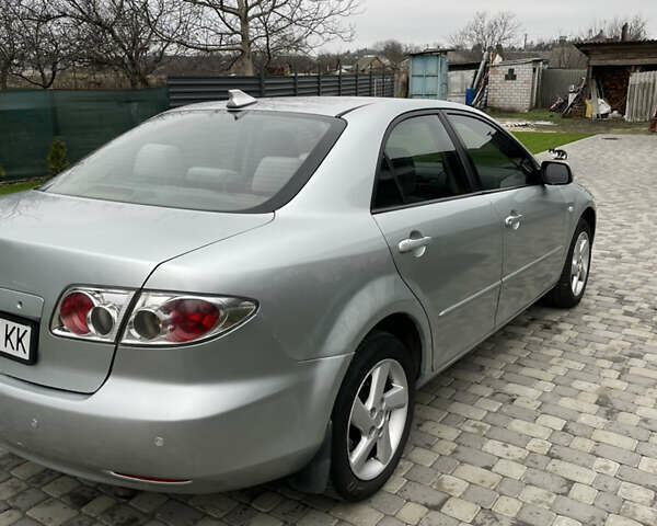 Серый Мазда 6, объемом двигателя 2 л и пробегом 228 тыс. км за 4400 $, фото 5 на Automoto.ua