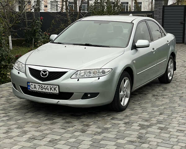 Серый Мазда 6, объемом двигателя 2 л и пробегом 228 тыс. км за 4400 $, фото 2 на Automoto.ua
