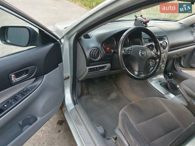 Серый Мазда 6, объемом двигателя 1.8 л и пробегом 415 тыс. км за 3000 $, фото 6 на Automoto.ua