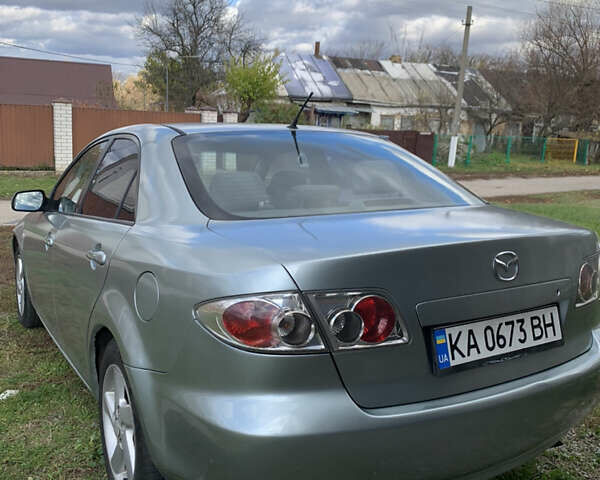 Серый Мазда 6, объемом двигателя 2 л и пробегом 412 тыс. км за 3700 $, фото 3 на Automoto.ua