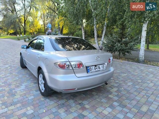 Серый Мазда 6, объемом двигателя 2 л и пробегом 243 тыс. км за 3900 $, фото 8 на Automoto.ua