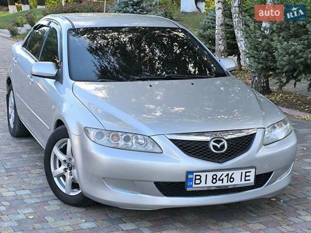 Серый Мазда 6, объемом двигателя 2 л и пробегом 243 тыс. км за 3900 $, фото 5 на Automoto.ua