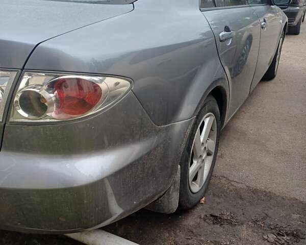 Сірий Мазда 6, об'ємом двигуна 1.99 л та пробігом 260 тис. км за 3300 $, фото 4 на Automoto.ua