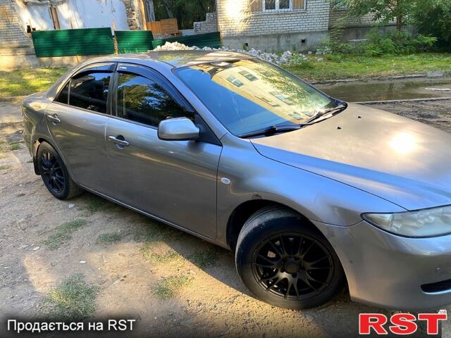 Серый Мазда 6, объемом двигателя 2 л и пробегом 240 тыс. км за 3000 $, фото 2 на Automoto.ua