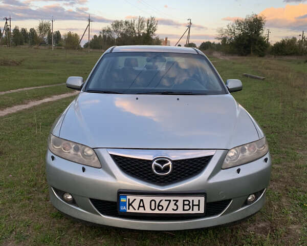 Серый Мазда 6, объемом двигателя 2 л и пробегом 412 тыс. км за 4000 $, фото 2 на Automoto.ua