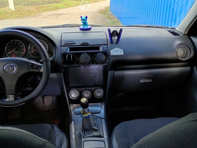 Серый Мазда 6, объемом двигателя 2 л и пробегом 273 тыс. км за 3500 $, фото 4 на Automoto.ua