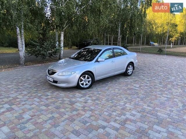 Серый Мазда 6, объемом двигателя 2 л и пробегом 243 тыс. км за 3900 $, фото 7 на Automoto.ua