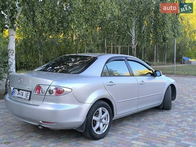 Серый Мазда 6, объемом двигателя 2 л и пробегом 243 тыс. км за 3900 $, фото 22 на Automoto.ua