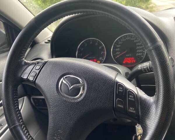 Серый Мазда 6, объемом двигателя 2 л и пробегом 235 тыс. км за 3900 $, фото 7 на Automoto.ua