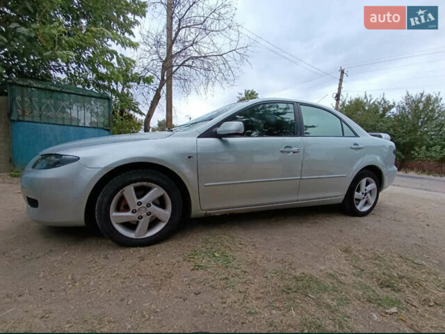 Серый Мазда 6, объемом двигателя 2 л и пробегом 255 тыс. км за 3650 $, фото 1 на Automoto.ua