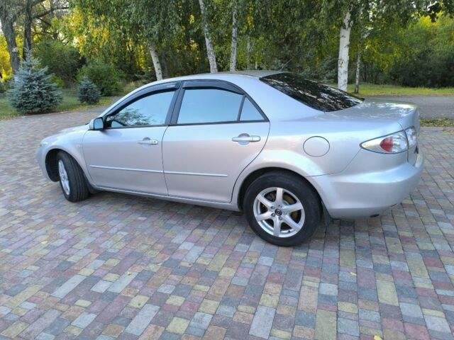 Серый Мазда 6, объемом двигателя 2 л и пробегом 243 тыс. км за 3900 $, фото 4 на Automoto.ua