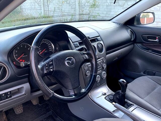 Сірий Мазда 6, об'ємом двигуна 2 л та пробігом 412 тис. км за 3700 $, фото 5 на Automoto.ua