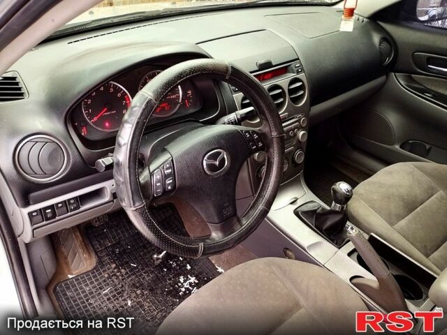 Серый Мазда 6, объемом двигателя 2 л и пробегом 218 тыс. км за 4000 $, фото 10 на Automoto.ua