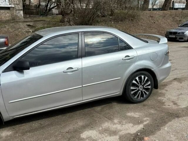 Серый Мазда 6, объемом двигателя 2 л и пробегом 398 тыс. км за 1700 $, фото 2 на Automoto.ua