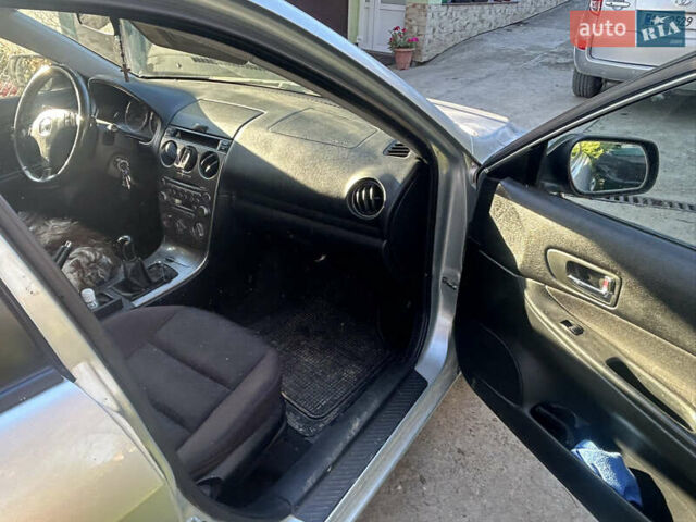 Серый Мазда 6, объемом двигателя 2 л и пробегом 520 тыс. км за 4100 $, фото 4 на Automoto.ua