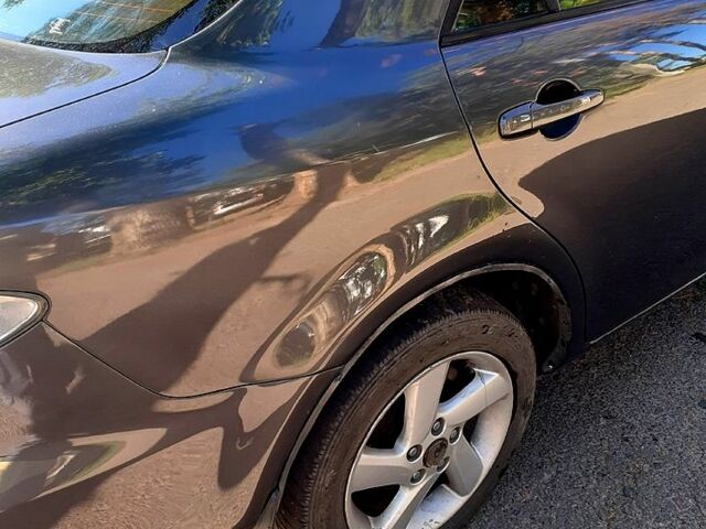 Серый Мазда 6, объемом двигателя 1.8 л и пробегом 408 тыс. км за 4800 $, фото 2 на Automoto.ua