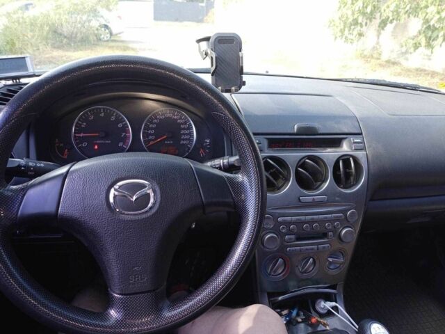 Серый Мазда 6, объемом двигателя 2 л и пробегом 112 тыс. км за 3300 $, фото 5 на Automoto.ua