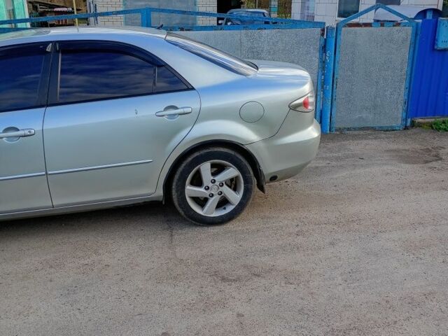 Серый Мазда 6, объемом двигателя 2 л и пробегом 273 тыс. км за 3500 $, фото 2 на Automoto.ua